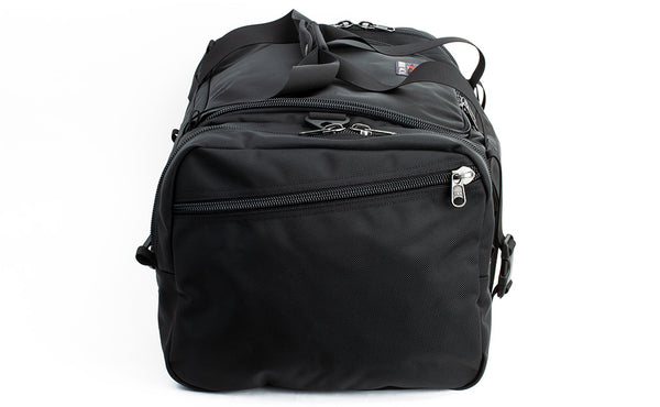 A side shot of the Road Buddy Duffel 60 showing the Fabric Side Pocket.